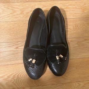 Black loafers, purchased in Paris